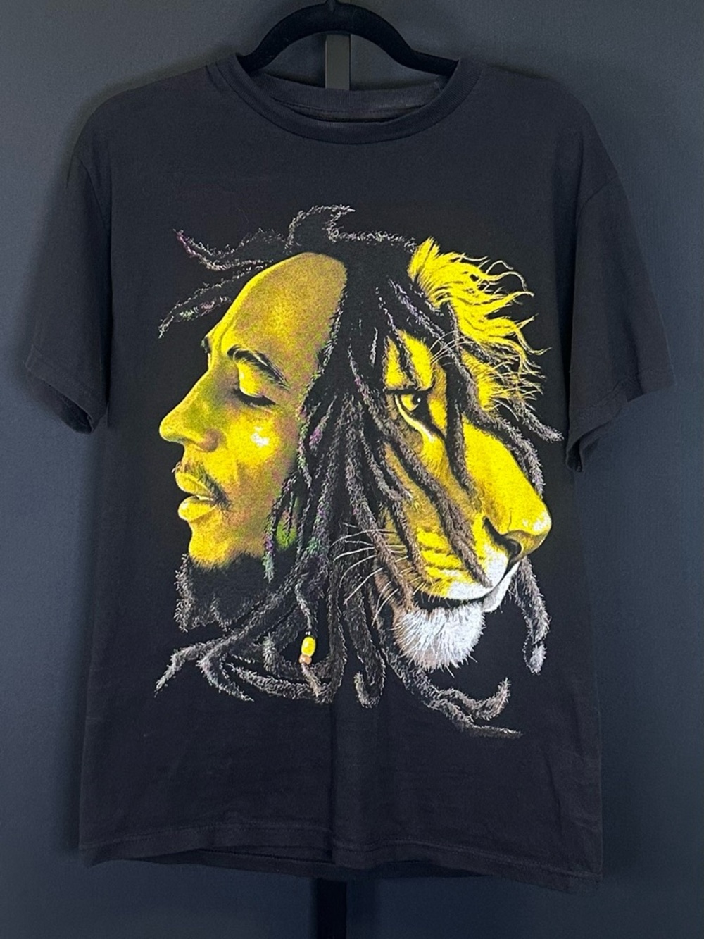 #168- Alstyle Black T Bob Marley's face merging into a lion's head